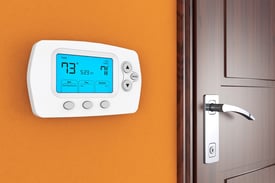 bigstock-Modern-Programming-Thermostat-81429269.jpg