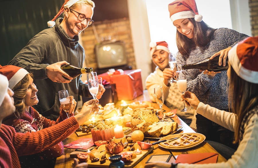 bigstock-Friends-Group-With-Santa-Hats--266946022